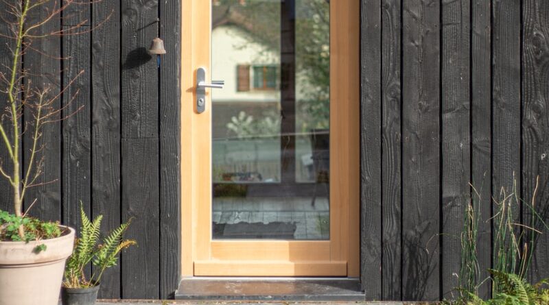 brown wooden framed glass window